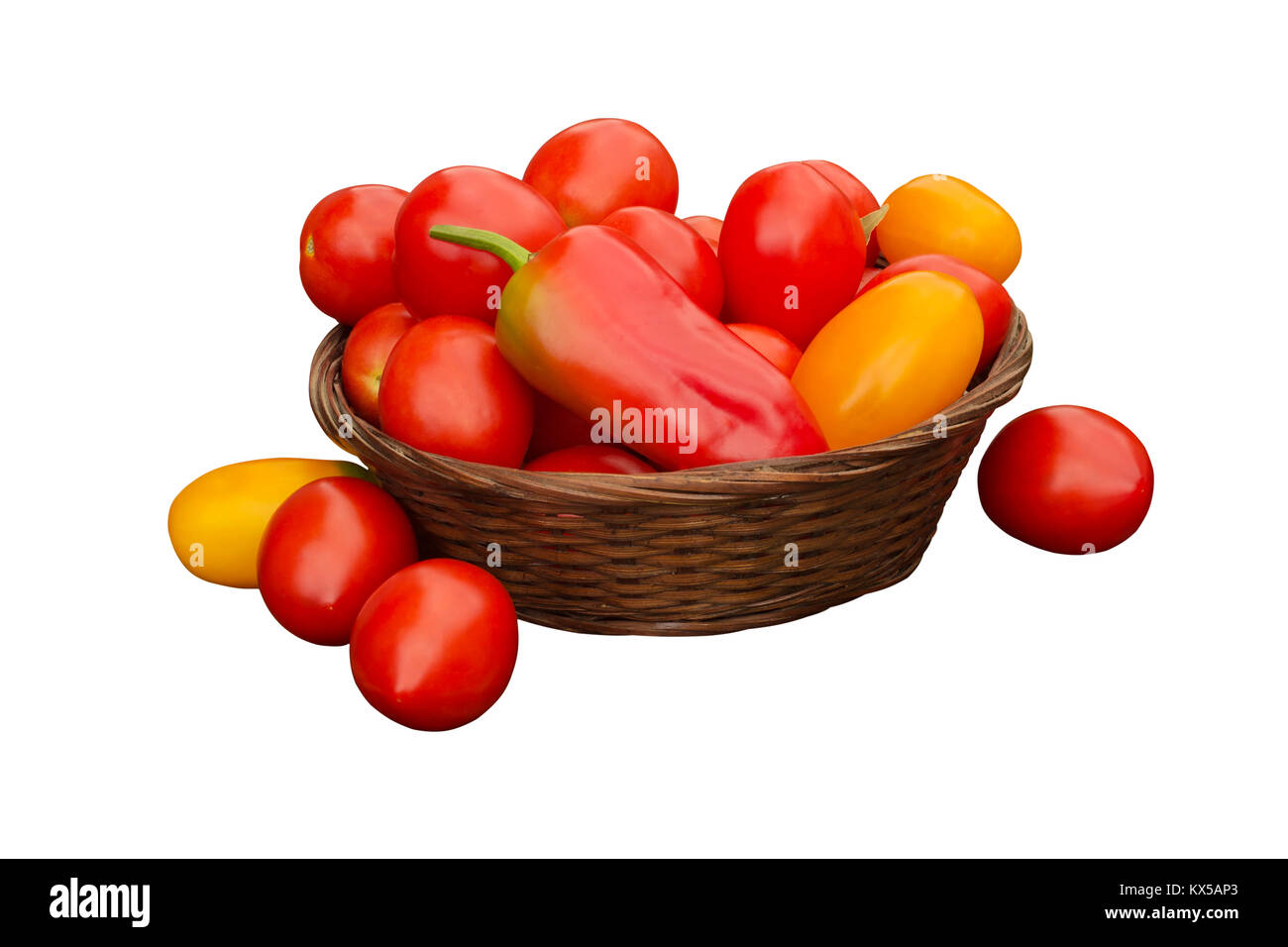 tomatoes in a basket on a white background Stock Photo - Alamy