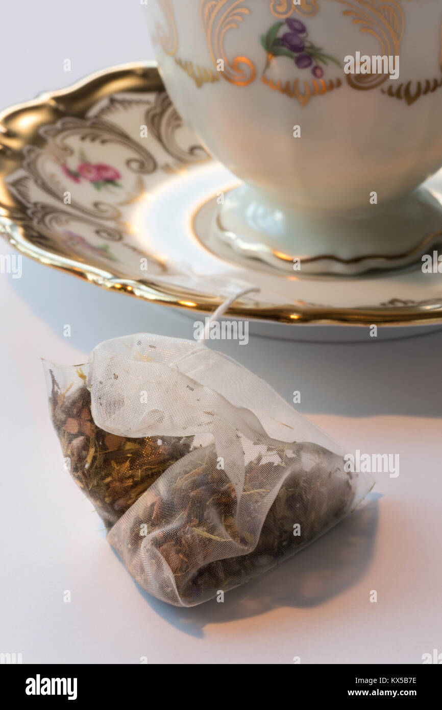 Silk Teabag with Porcelain Cup and Saucer in Background Stock Photo Alamy