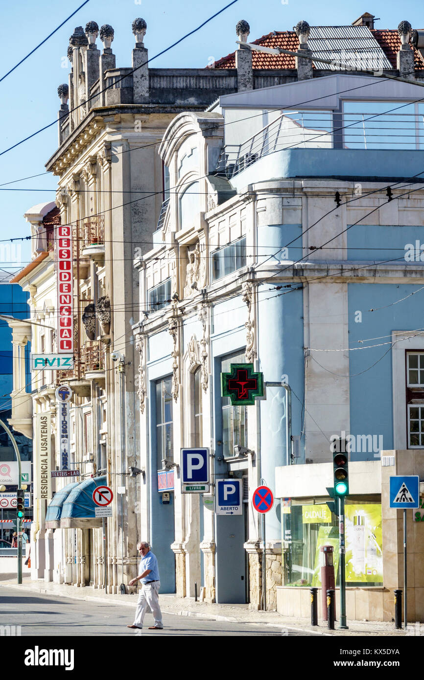 Coimbra Portugal,historic center,building,street,signs,Residencial Aviz,guest house,man men male,senior seniors citizen citizens,crossing,traffic ligh Stock Photo