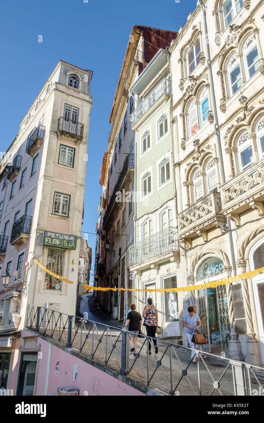 Coimbra Portugal,historic center,Rua Viscount da Luz,ascending,uphill,street,building,corner,city skyline,Hispanic,immigrant immigrants,Portuguese,PT1 Stock Photo