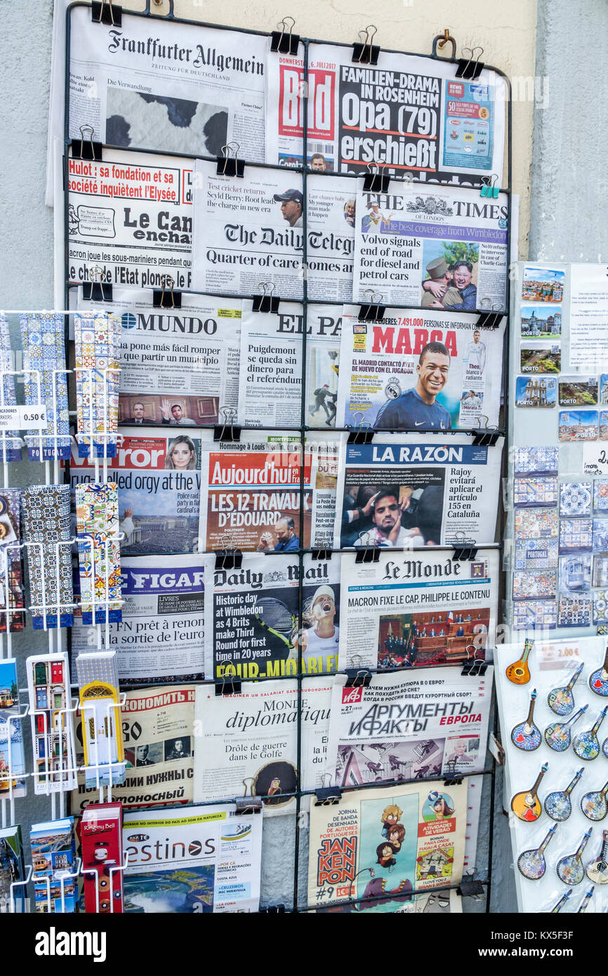 Porto Portugal,newsstand,rack,international news,newspapers,headlines,Portuguese,Russian,Spanish,French,English,language,display sale Hispanic,immigra Stock Photo