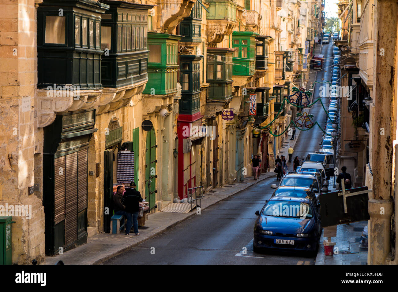 Street scene with Gallarija, typical wooden balcony in Valletta, european capital of culture in 2018, Malta, Europe Stock Photo