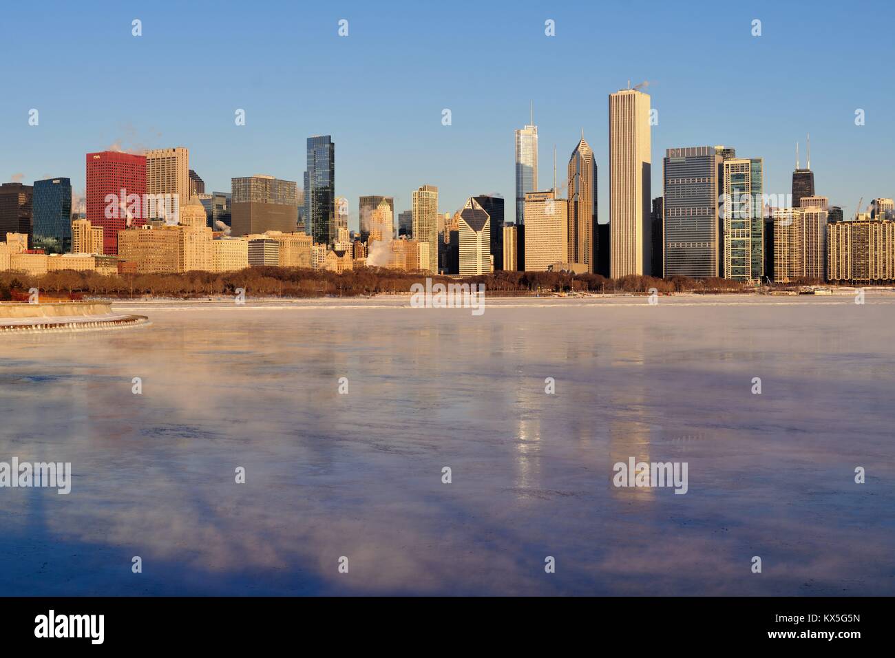 Chicago, Illinois, USA. Winds and bitter cold created vapor above the ice in Lake Michigan and exhausting from buildings. Stock Photo