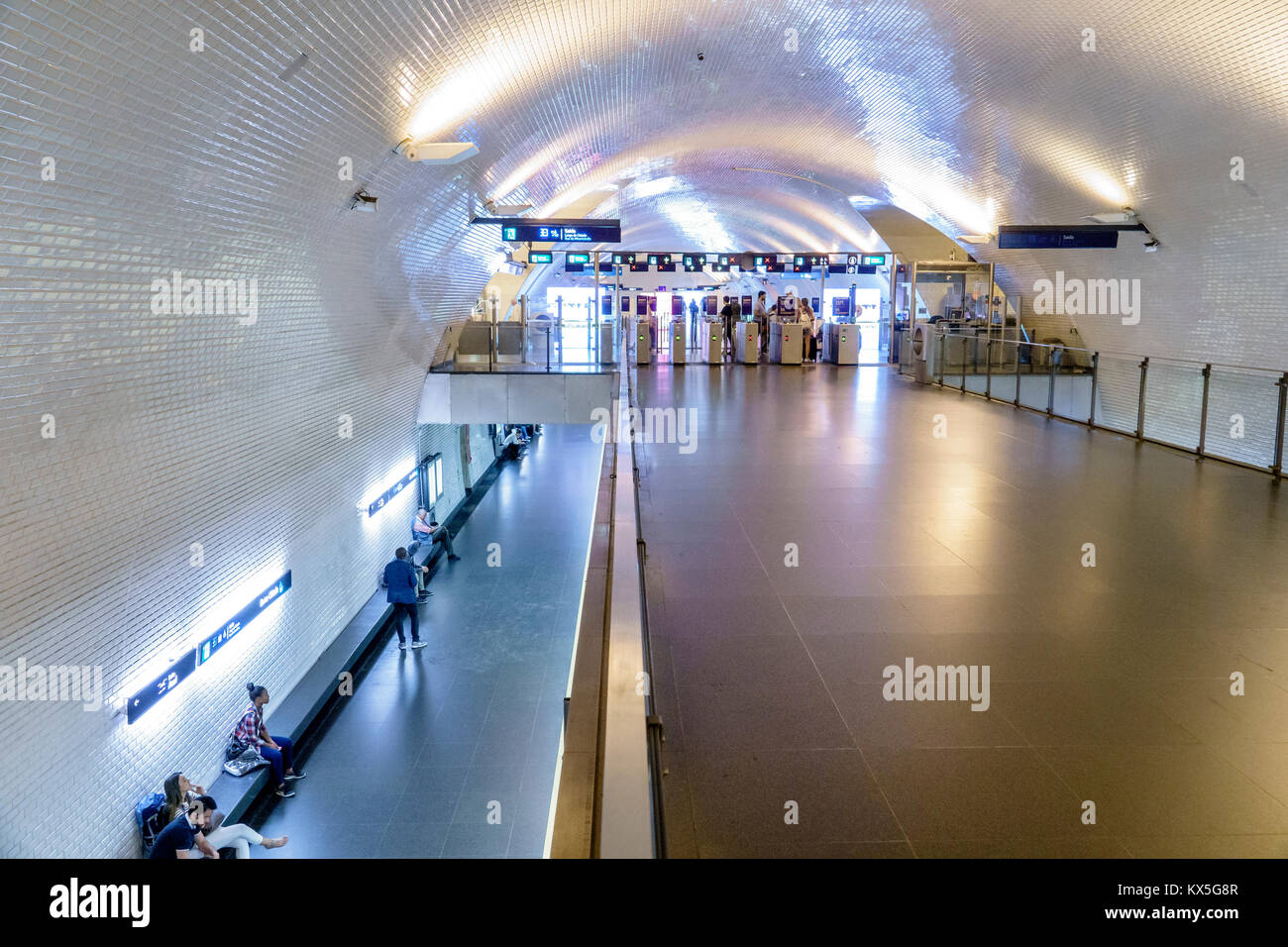 Lisbon Portugal,Baixa-Chiado,Metro Lisboa,public transportation,mass transit,subway,station,atrium,platform,passenger passengers rider riders,overhead Stock Photo