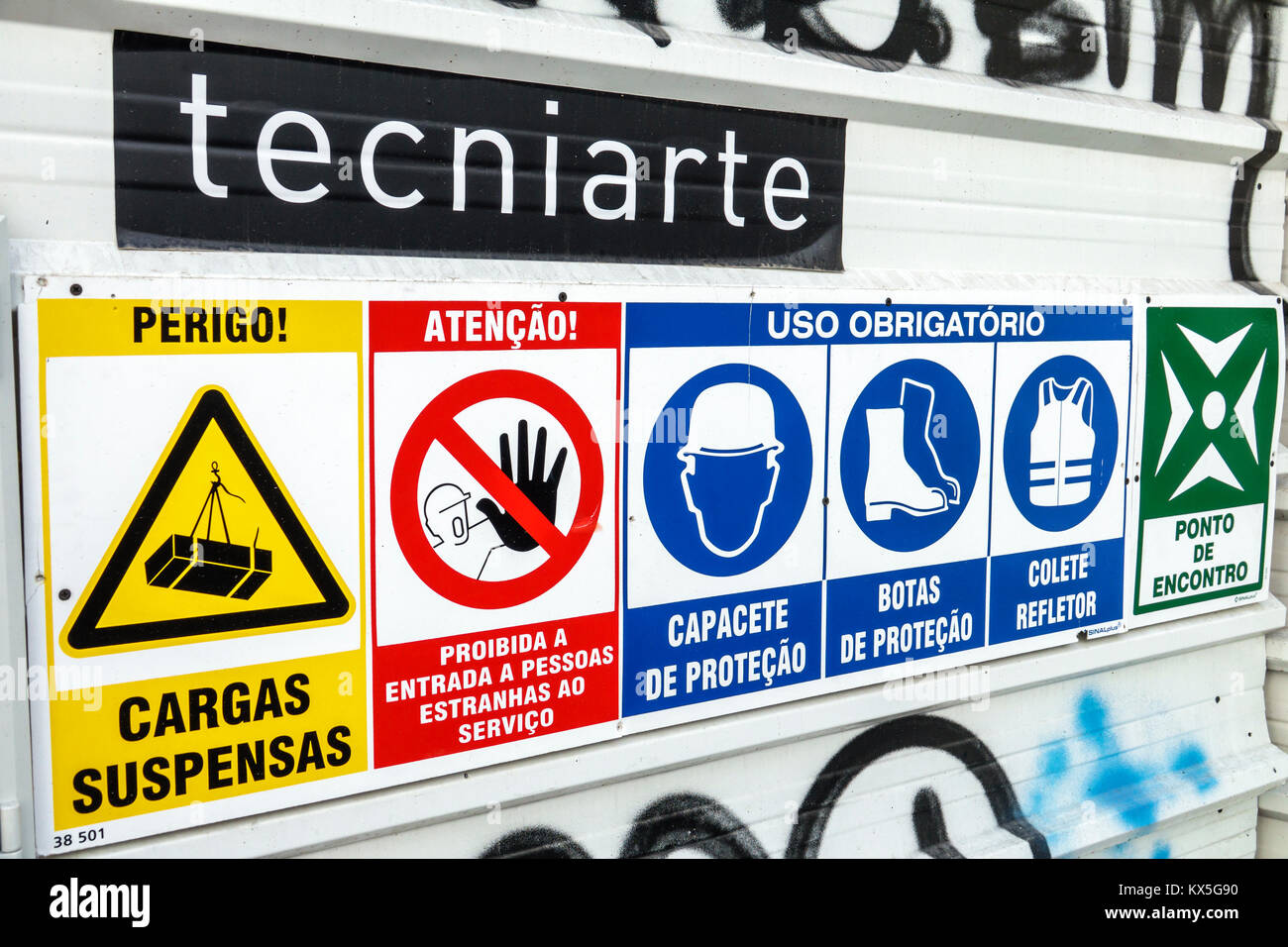 Lisbon Portugal,under new construction site building builder site,sign,worker protection,warning,danger,hard hat area,required safety apparel,reflecti Stock Photo