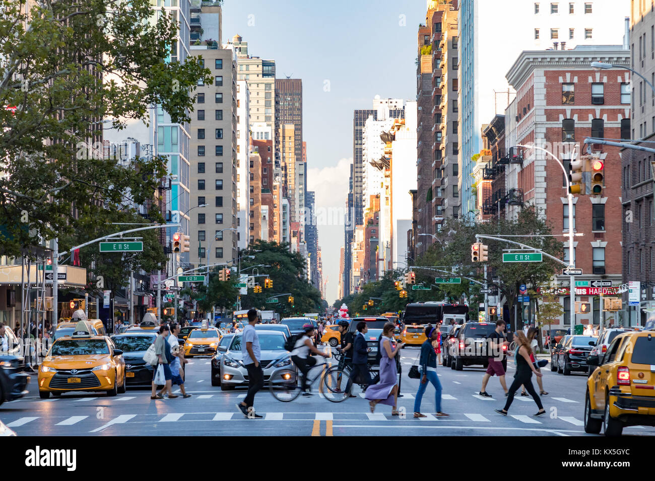 NEW YORK CITY - CIRCA 2017: Busy crowds of people walk across 3rd ...