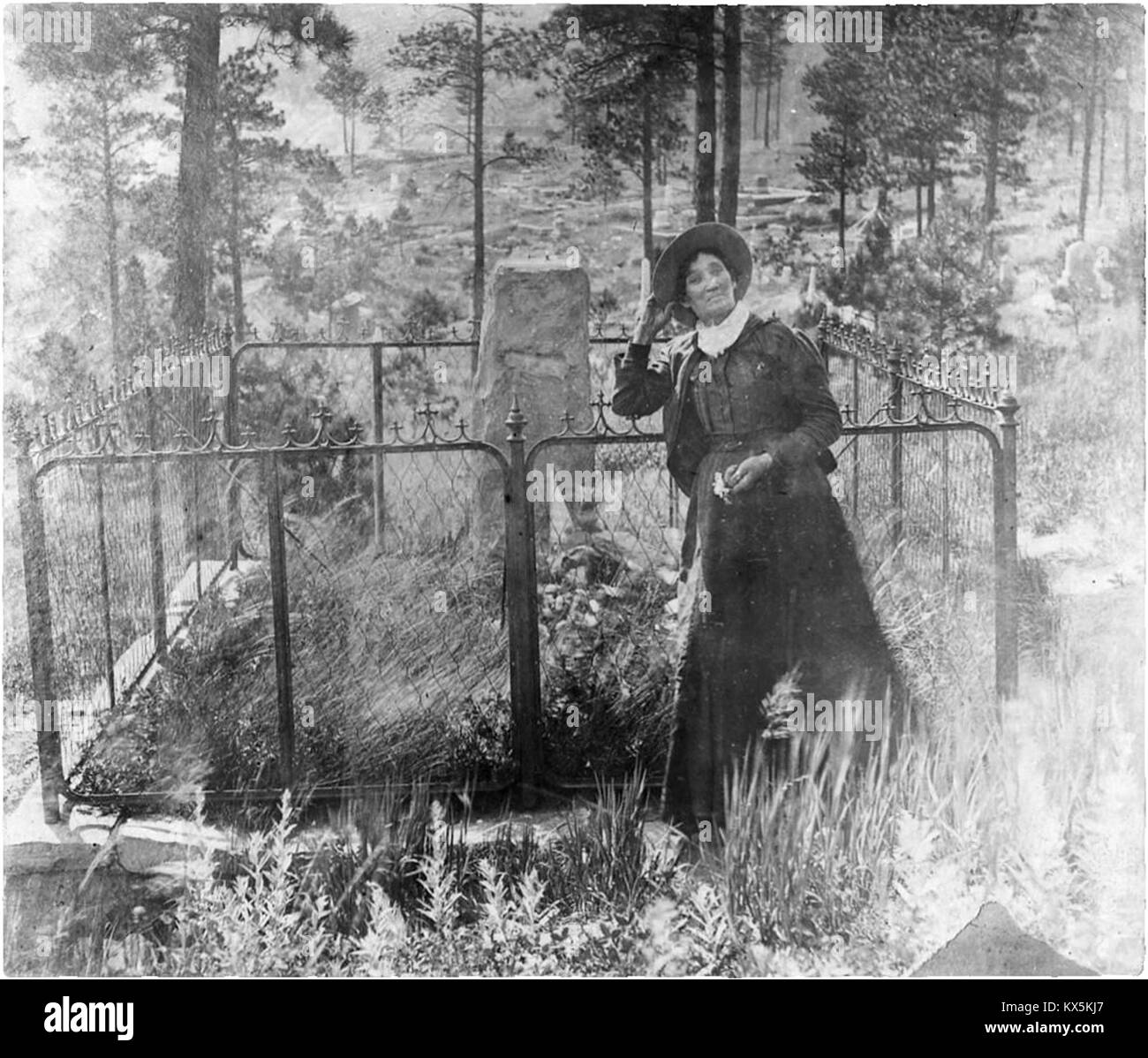Calamity Jane at Wild Bill Hickok's grave Stock Photo