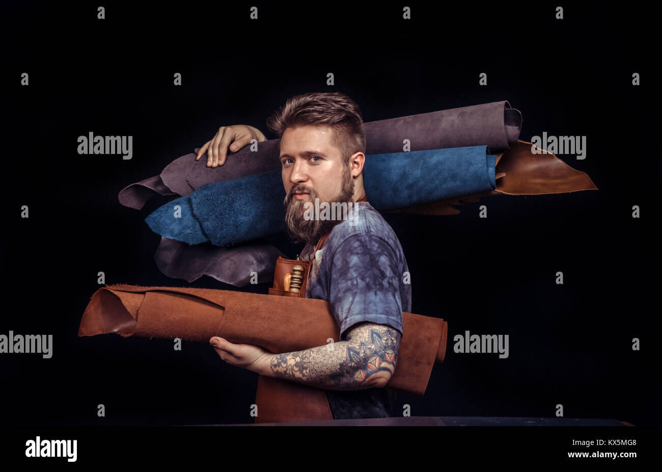 Leather Tanner Rack Professional Tanner working with leather using crafting tools Stock ...