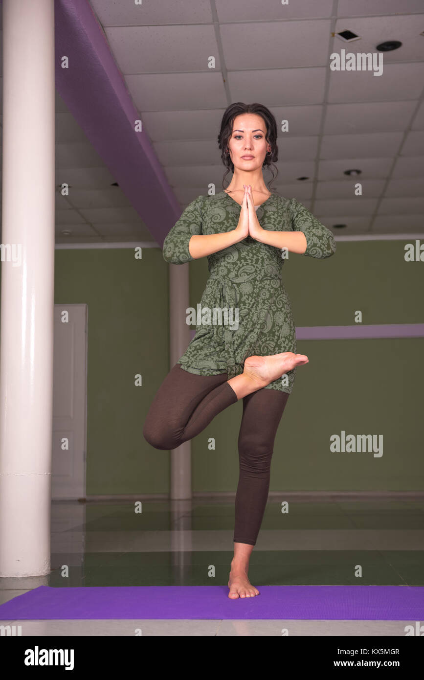 Female yogi stretching body hi-res stock photography and images - Alamy