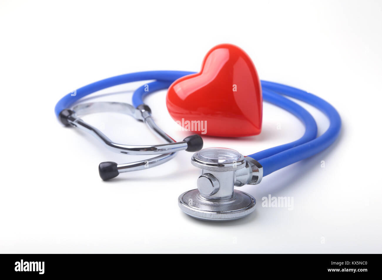 Red heart and a stethoscope on white background Stock Photo - Alamy