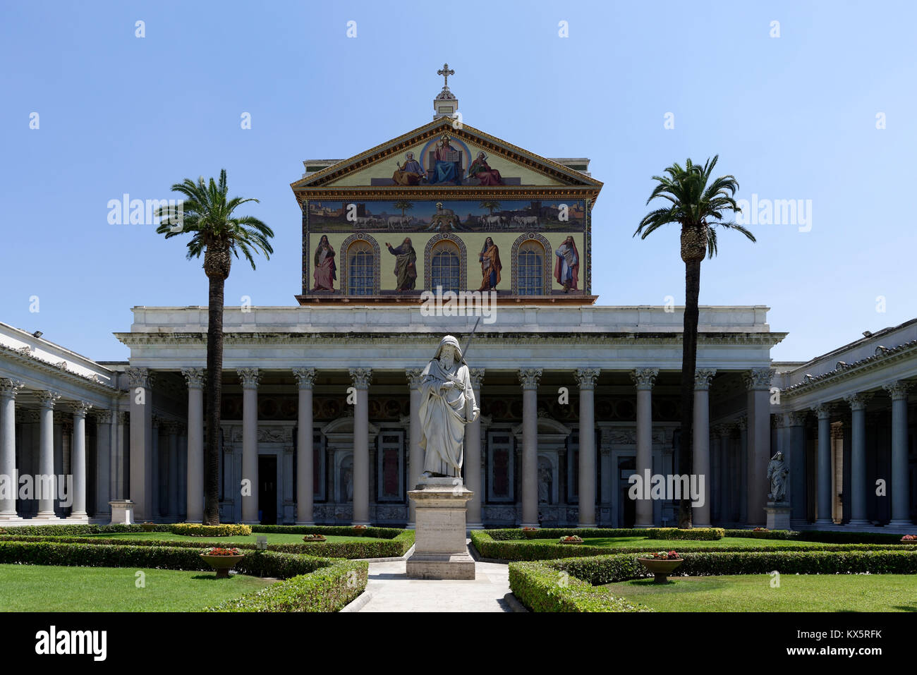 The courtyard with its portico of white granite columns of the Papal Basilica of St. Paul outside the Walls. Rome, Italy. Erected during the 4th centu Stock Photo