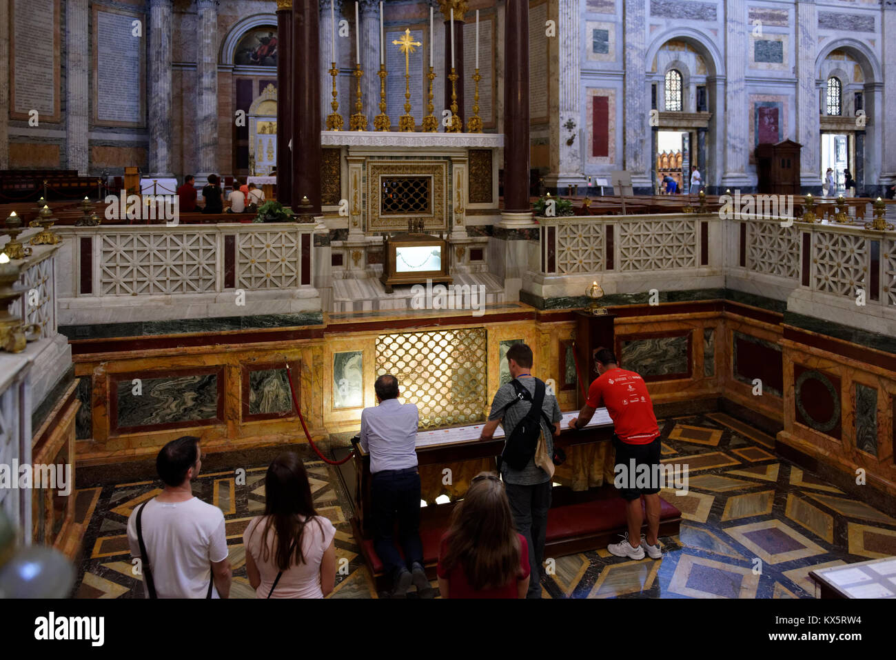 People viewing the prison chains and tomb of St. Paul Apostle. The Papal  Basilica of St. Paul outside the Walls. Rome, Italy. Erected during the 4th  c Stock Photo - Alamy