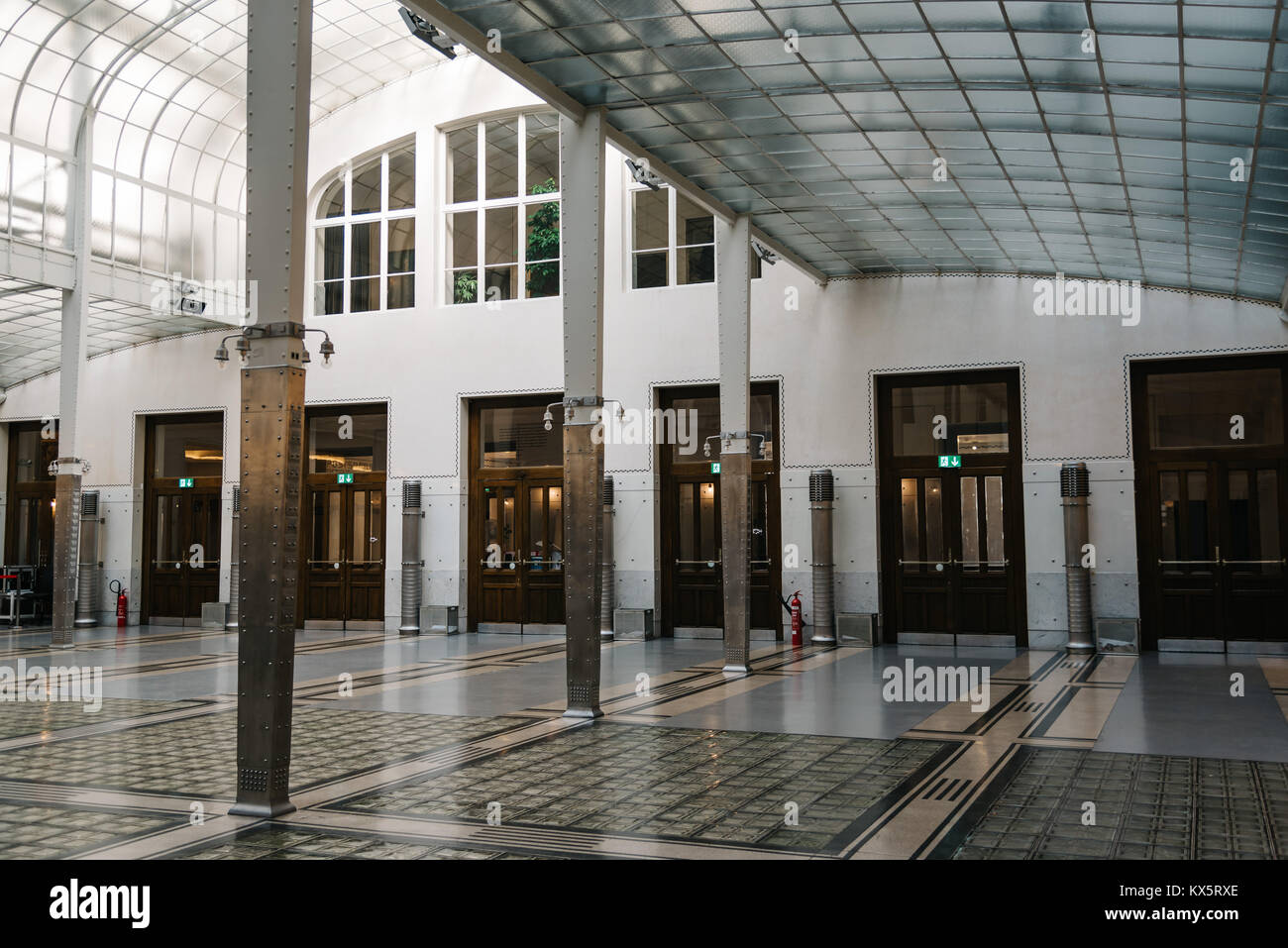 Vienna,  Austria - August 17, 2017: Main hall of Austrian Postal Savings Bank building called Osterreichische Postsparkasse designed by architect Otto Stock Photo