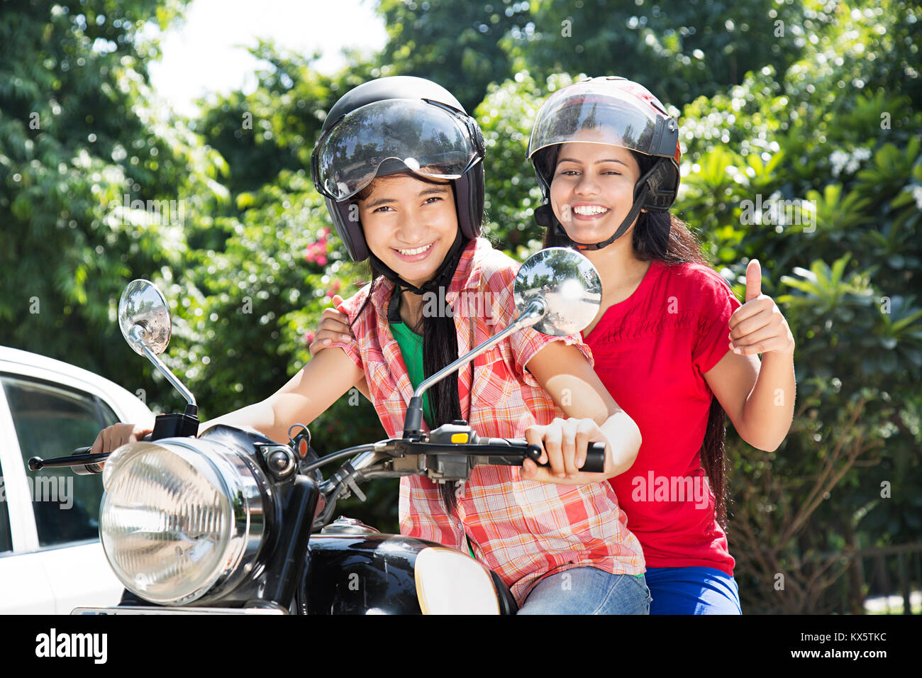 2 Indian Young Girls Friend Ride Bullet Bike Fun Cheerful Stock Photo