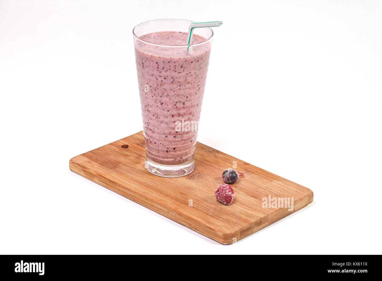 Blueberry and raspberry smoothie on wooden plate Stock Photo