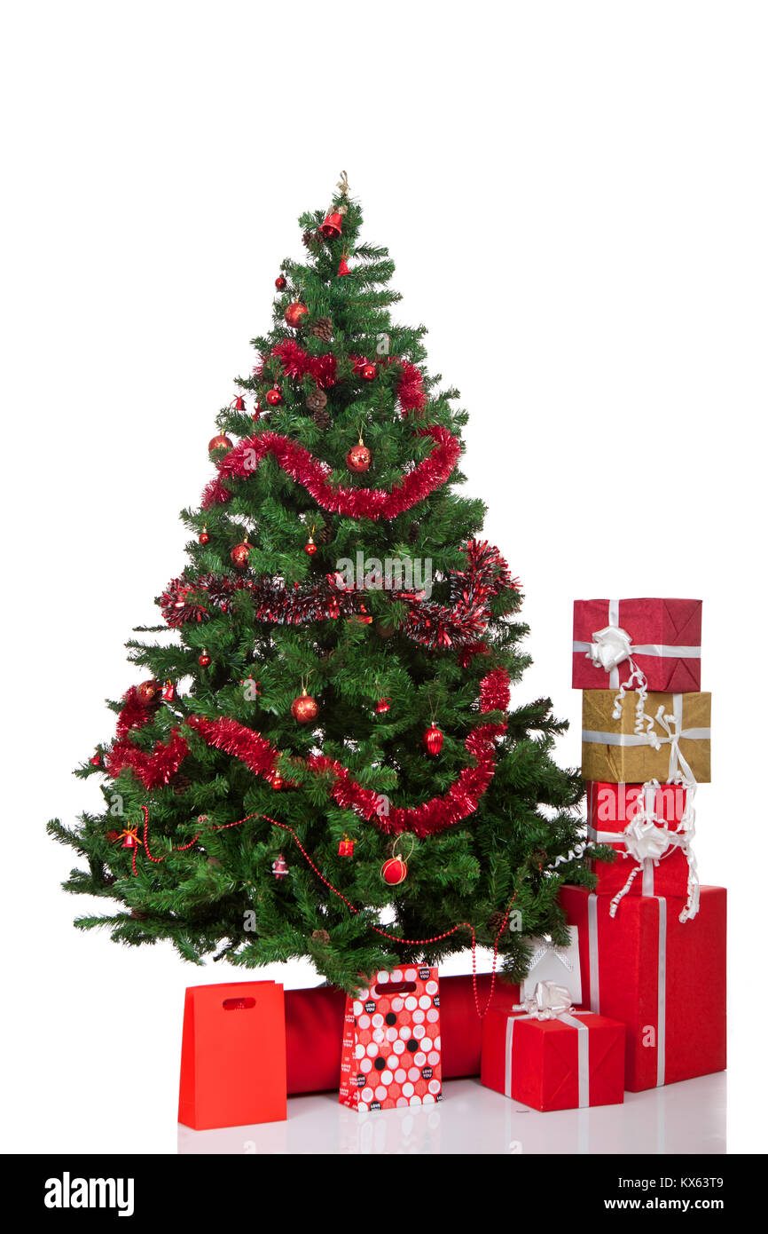 christmas tree and gift boxes, isolated on white background Stock Photo ...