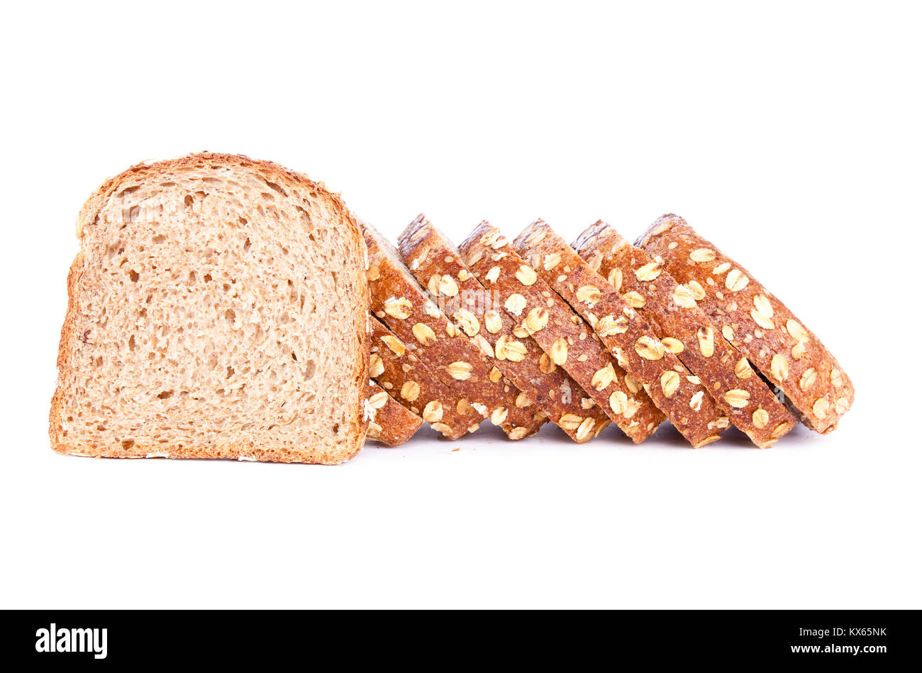 Healthy bran bread slices with oats isolated on white background Stock Photo