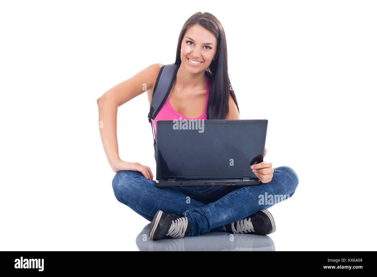 beautiful young girl sitting on floor with laptop Stock Photo - Alamy