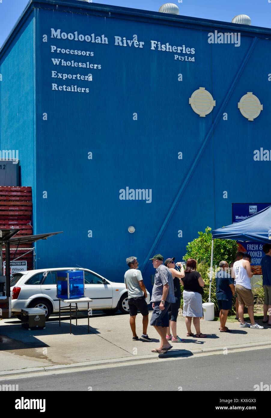 Lines of customers waiting to buy fresh seafood the day before