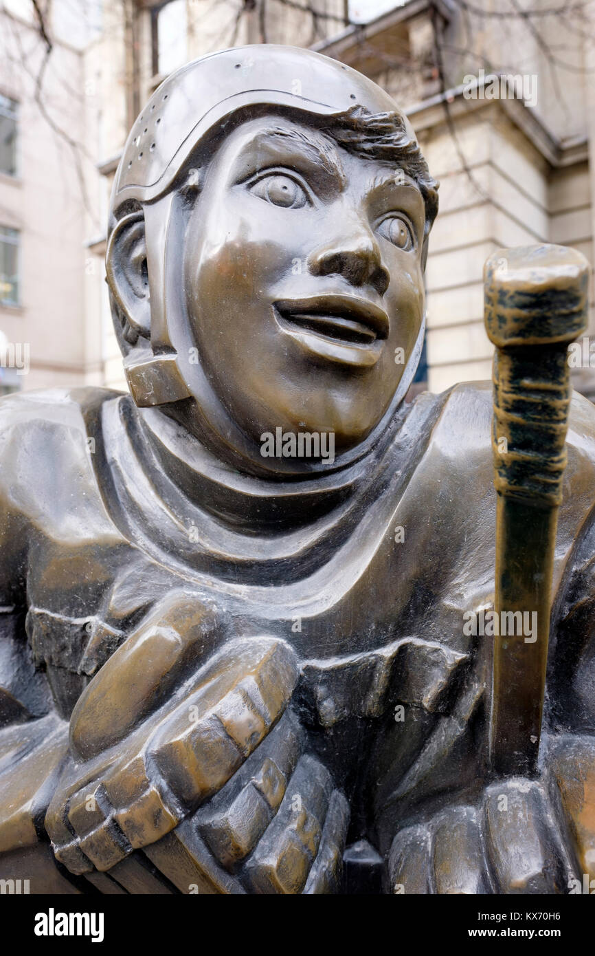 Close-up of Our Game, bronze sculpture by Canadian artist Edie Parker, front of Toronto Hockey Hall of Fame Museum, downtown Toronto, Ontario, Canada. Stock Photo