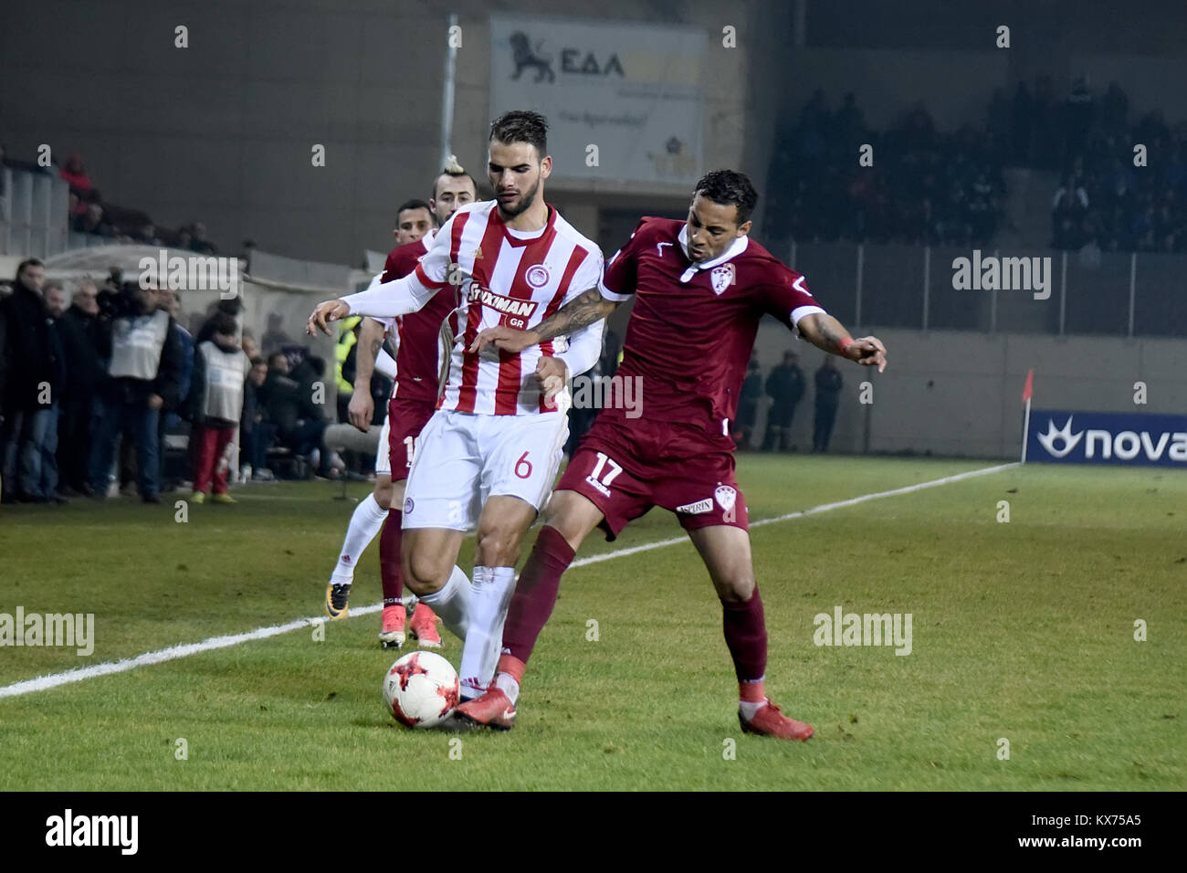 January 7, 2018 - Larissa, Greece - Olympiacos FC Midfielder Panagiotis Tachtsidis (Left) in action during a Greek superleague match between AEL FC and Olympiacos FC. Greek Superleague soccer match at the Greek city of Larissa between AEL FC and Olympiacos FC. The result of the was 0-3 with the victory of Olympiacos FC, which keeped the lead on the tableboard of the Greek Soccer Championship. (Credit Image: © Giannis Papanikos via ZUMA Wire) Stock Photo