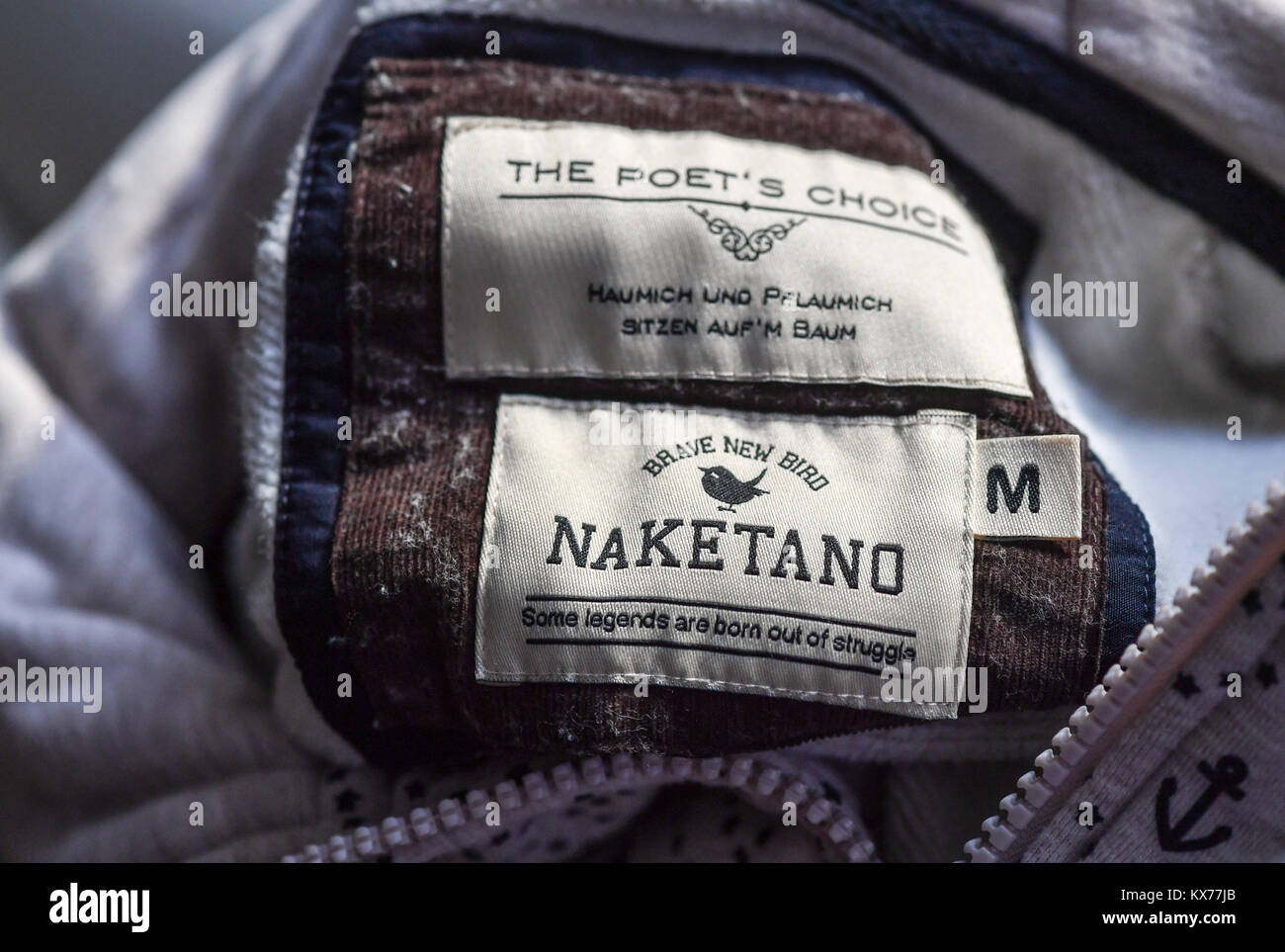Berlin, Germany. 07th Jan, 2018. The logo of German fashion label Naketano  from Essen seen on a sweatshirt in Berlin, Germany, 07 January 2018. The  other label reads 'The Poets choice' with