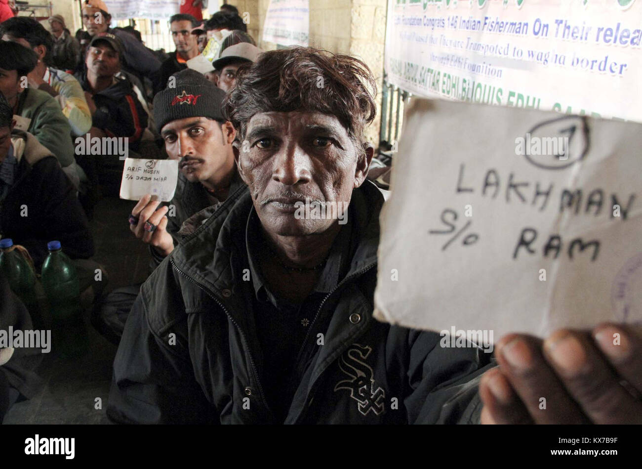 Indian fishermen who arrested by Pakistan Maritime Security Agency are leaving Pakistan after release by authorities as gesture of goodwill, at Cantonment Railway Station in Karachi on Sunday, January 07, 2018. Pakistan authorities released 147 Indian fishermen held for trespassing into its territorial waters as a goodwill gesture to its neighbor India. Stock Photo