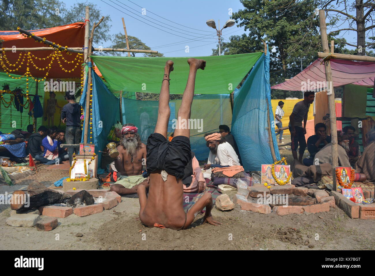 Kolkata, India. 08th Jan, 2018. Camping Naga Sadhus, devotees, rituals and visitors at Ganga Sagar Shivir, Outram Ghat transit camp for Ganga Sagar Mela 2018. Credit : Rupa Ghosh/Alamy Live News. Stock Photo