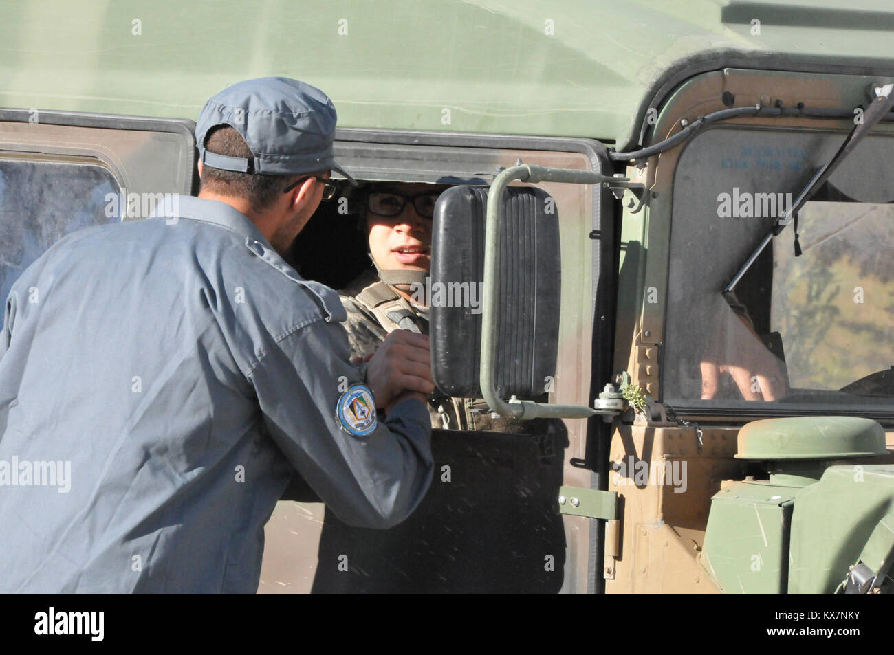 A human intelligence collector tries to get information from a role ...