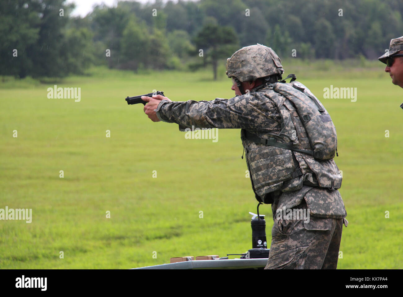 US Army National Guard military training in the field. Practicing ...