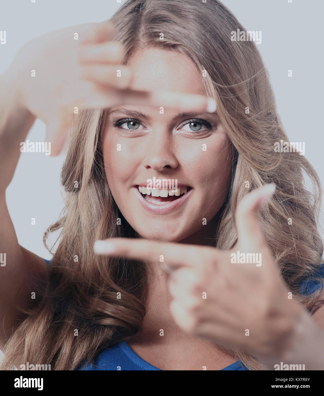 Young woman frame her face with hands Stock Photo Alamy