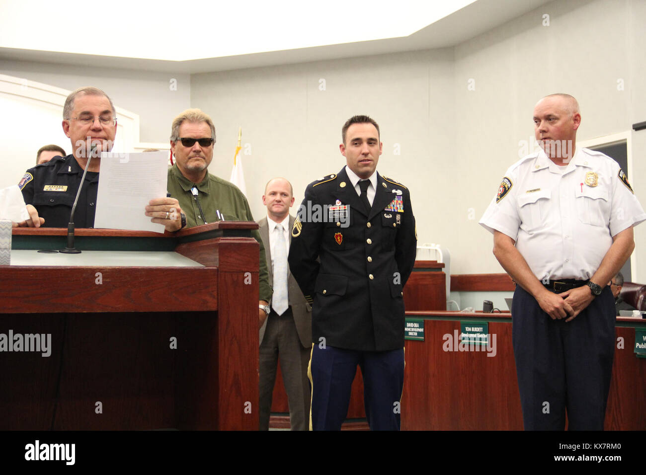 Staff Sgt. Robert Kelley and civilian Kirby were honored by West Jordan