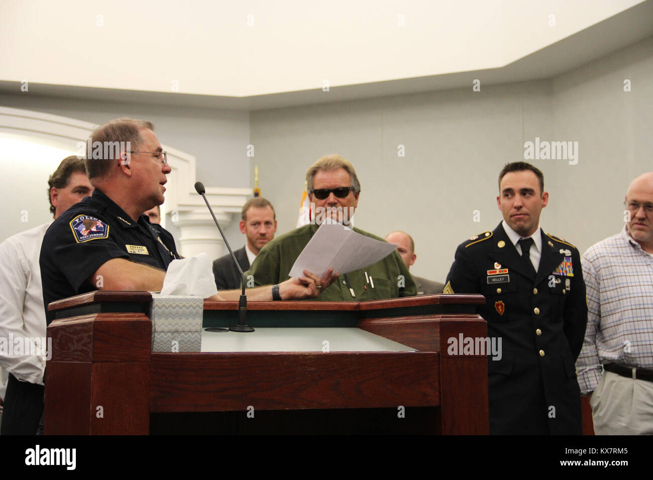 Staff Sgt. Robert Kelley and civilian Kirby were honored by West Jordan