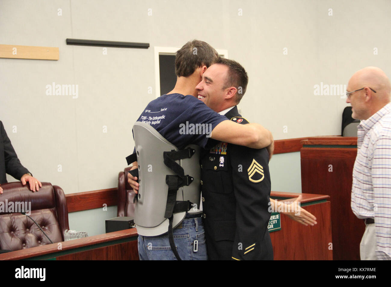 Staff Sgt. Robert Kelley and civilian Kirby were honored by West Jordan