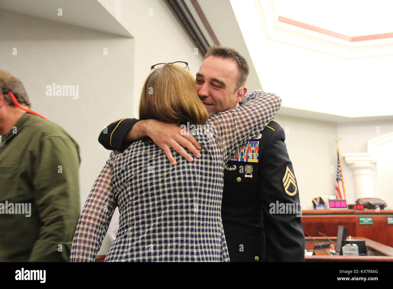 Staff Sgt. Robert Kelley and civilian Kirby were honored by West Jordan