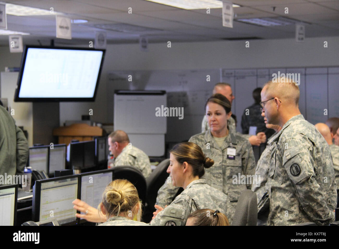 Members of the Utah National Guard participate in the Joint Operations Center as part of training exercise Vigilant Guard Utah 2014, #VGUT14,  at the Utah National Guard Headquarters in Draper, Utah Nov. 2, 2014. Stock Photo