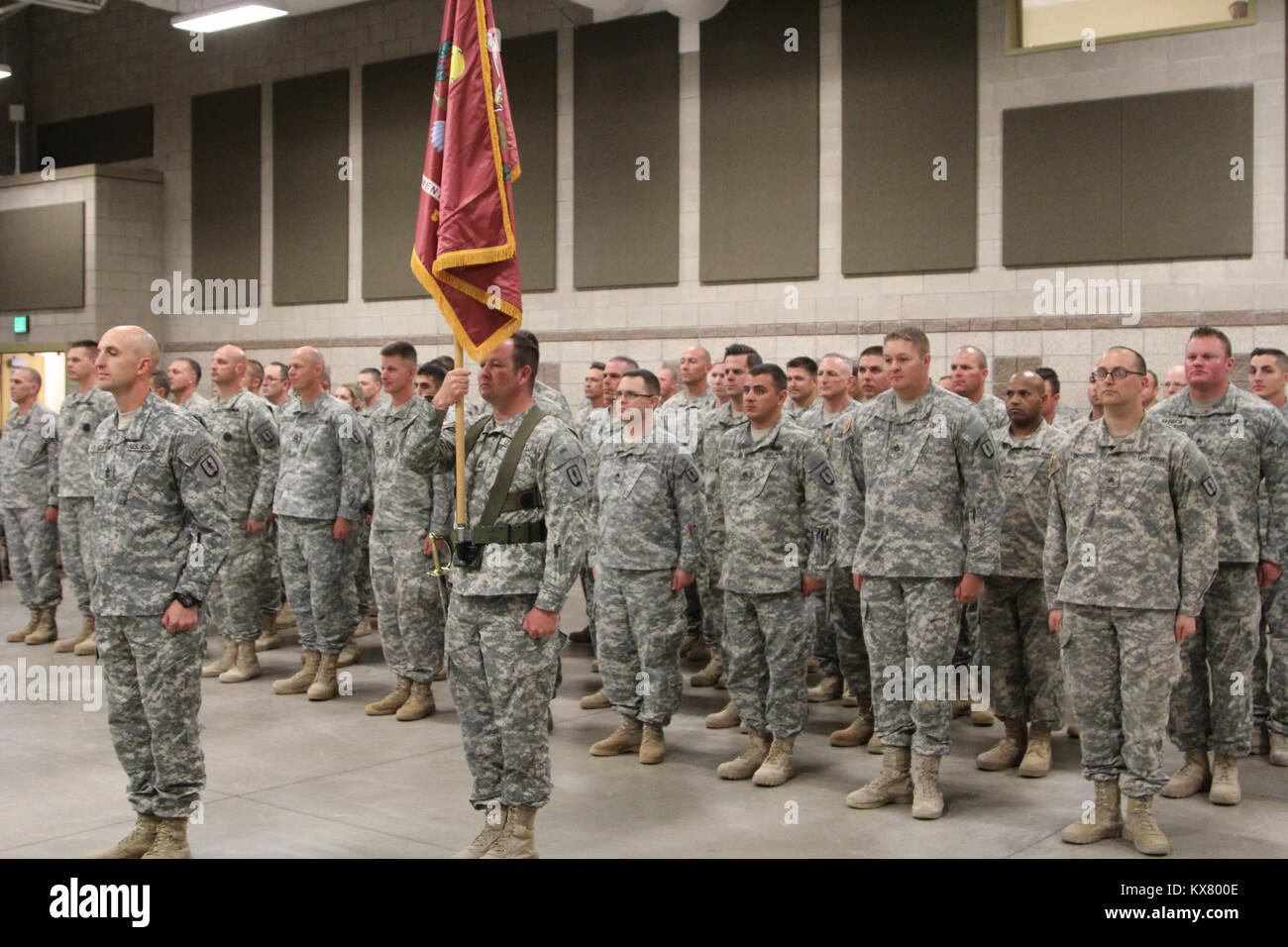 The 640th Regiment conducted change of responsibility where Command Sgt. Maj. Eric Anderson passed responsibility to Command Sgt. Major Spencer Nielsen, who was just promoted during the ceremony, at the TASS facility on Camp Wiliams May 14, 2015. Stock Photo