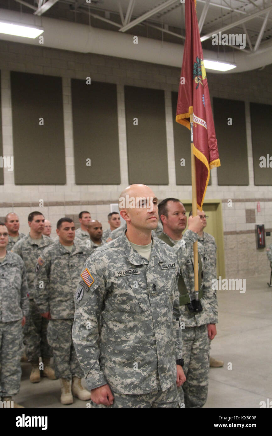 The 640th Regiment conducted change of responsibility where Command Sgt. Maj. Eric Anderson passed responsibility to Command Sgt. Major Spencer Nielsen, who was just promoted during the ceremony, at the TASS facility on Camp Wiliams May 14, 2015. Stock Photo