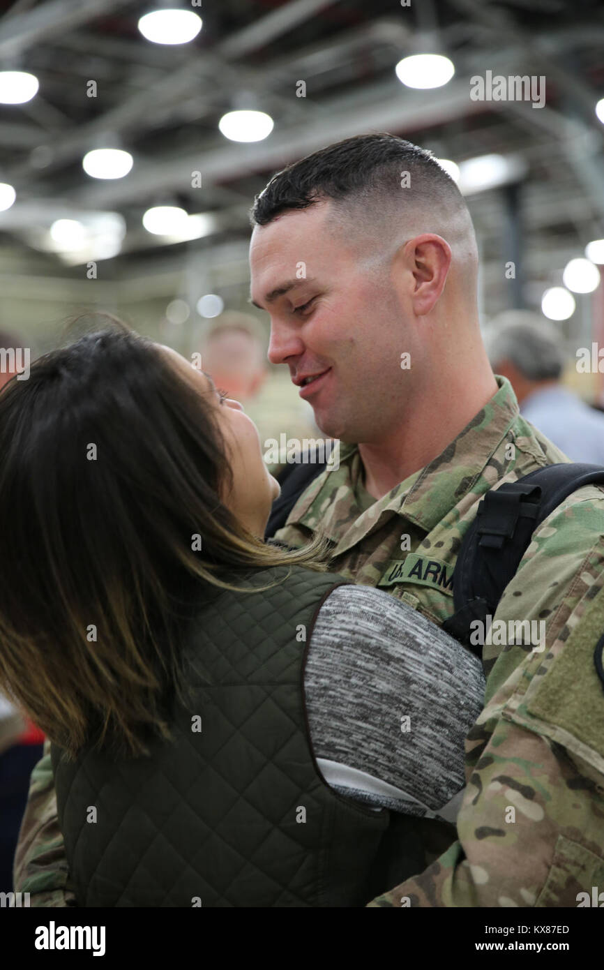 US Army National Guard welcome home from family and friends after