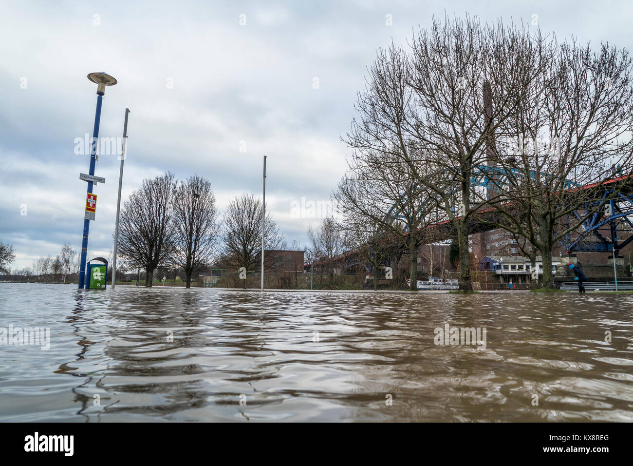 DUISBURG / GERMANY - JANUARY 08 2017 : The river Rhine is flooding the Muehlenweide in Ruhrort Stock Photo
