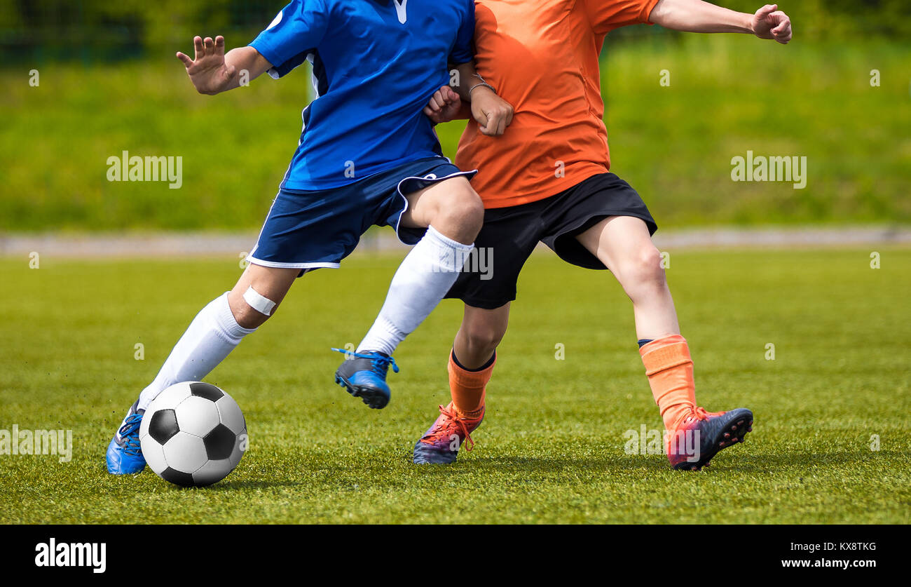 Football match for young players. Training and football soccer