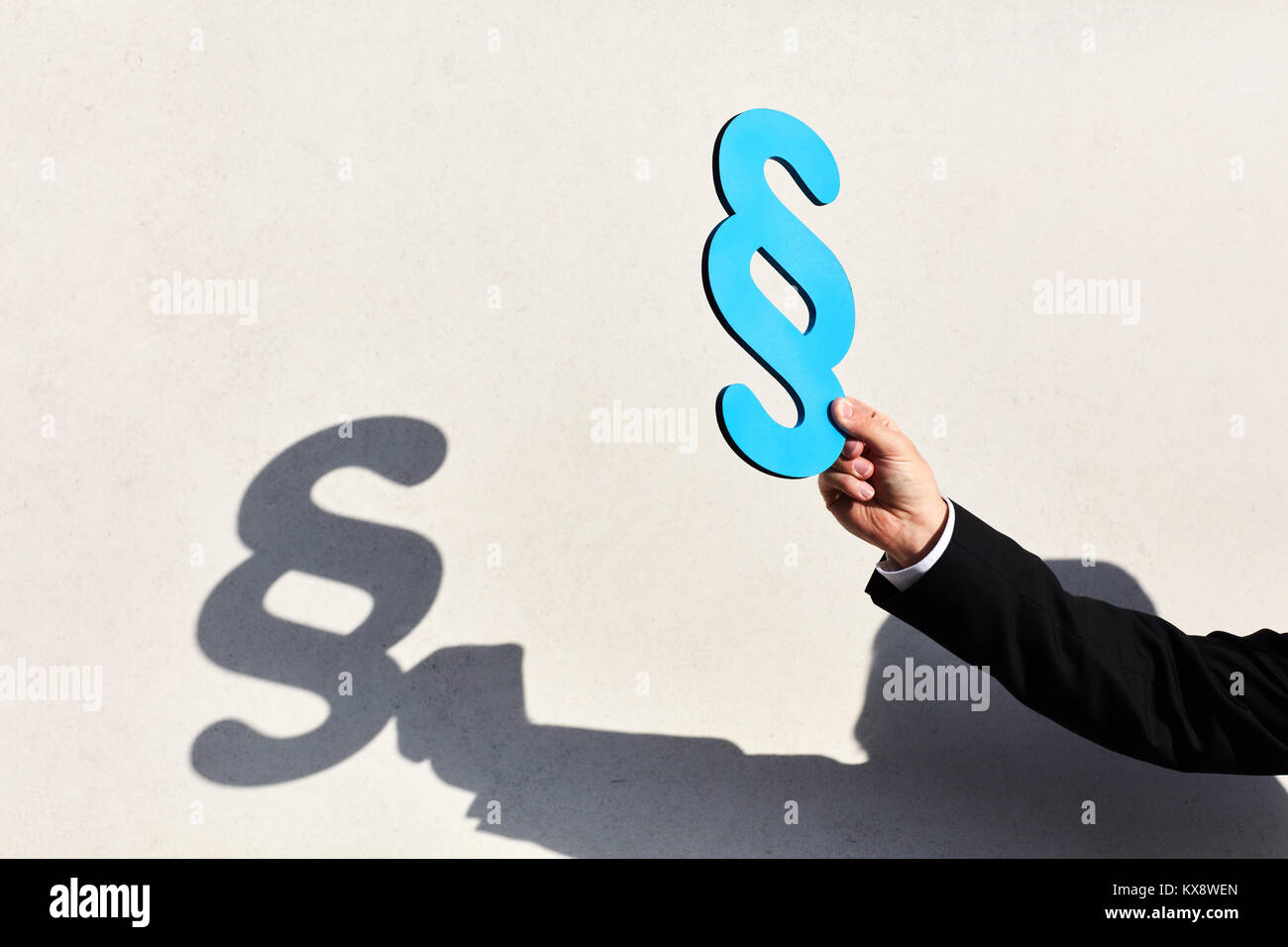 Hand holds a paragraph as a symbol for pros and cons in the process ...