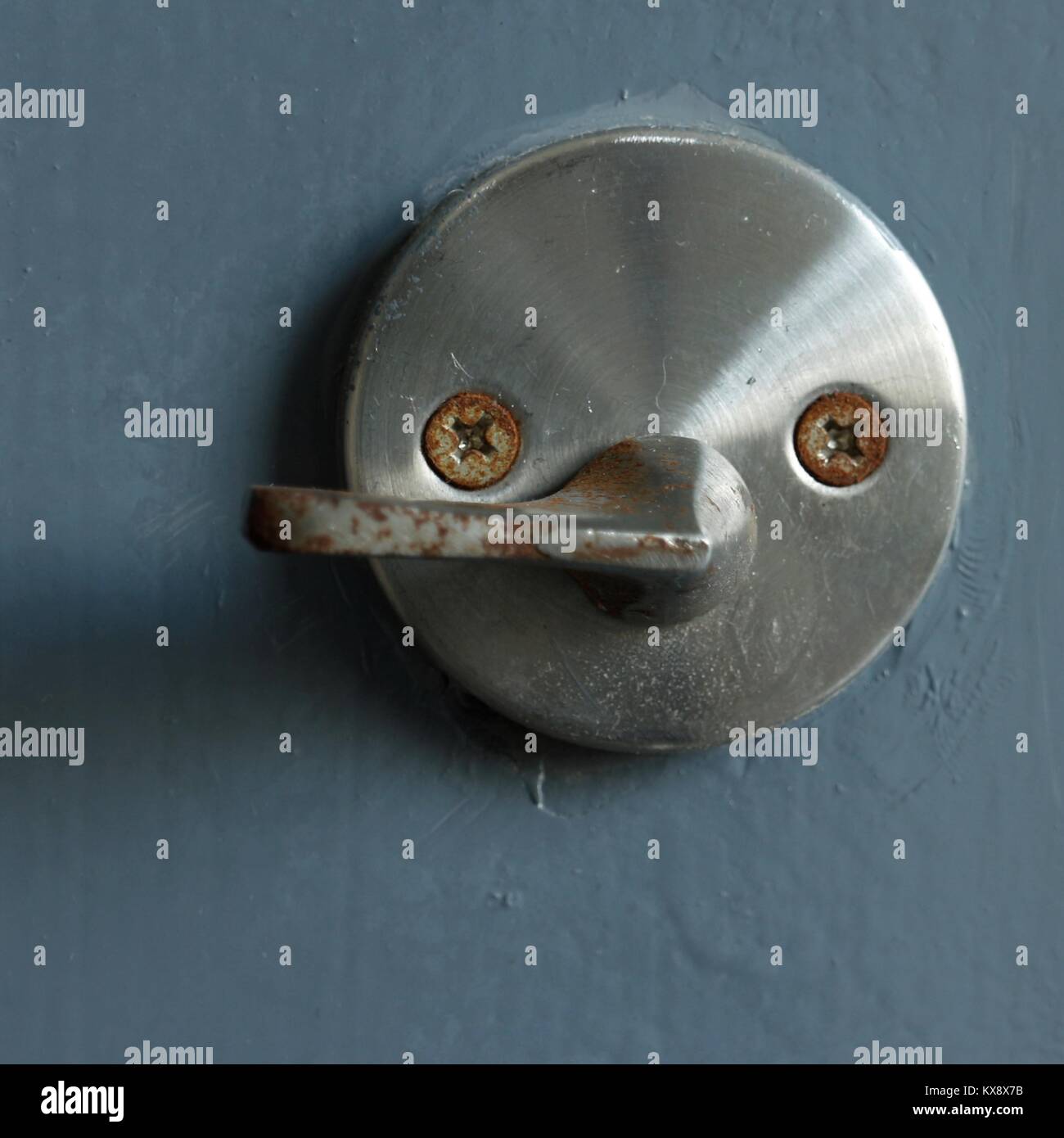 Anthropomorphic door lock in shape of face. Stock Photo