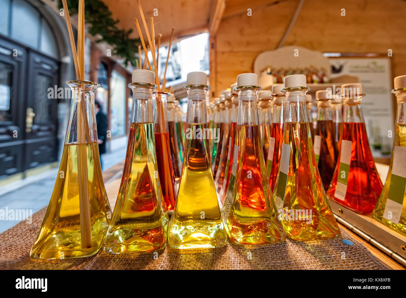 Colored bottles of fragrances with sticks for the fragrance of the house. Stock Photo