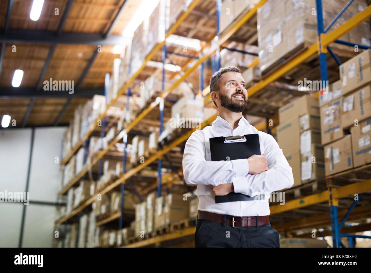 Portrait of a male warehouse worker or supervisor Stock Photo - Alamy