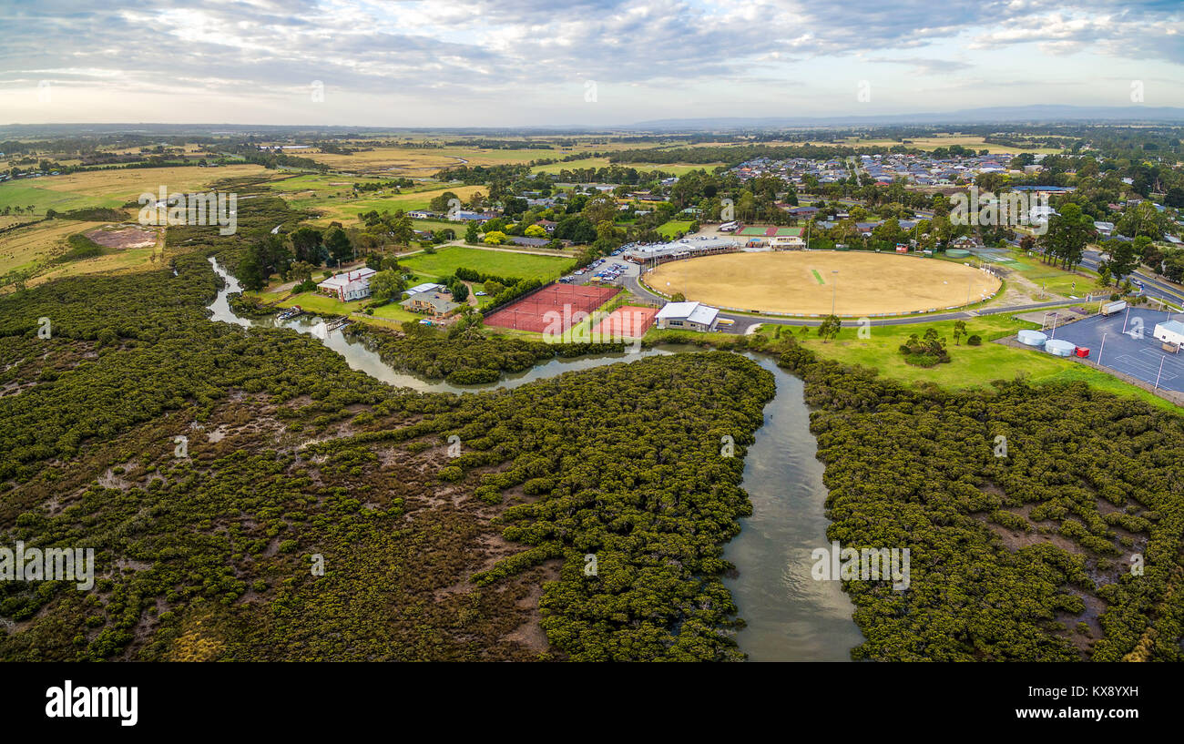 Aerial panorama of coastal mangroves and sports oval in Tooradin
