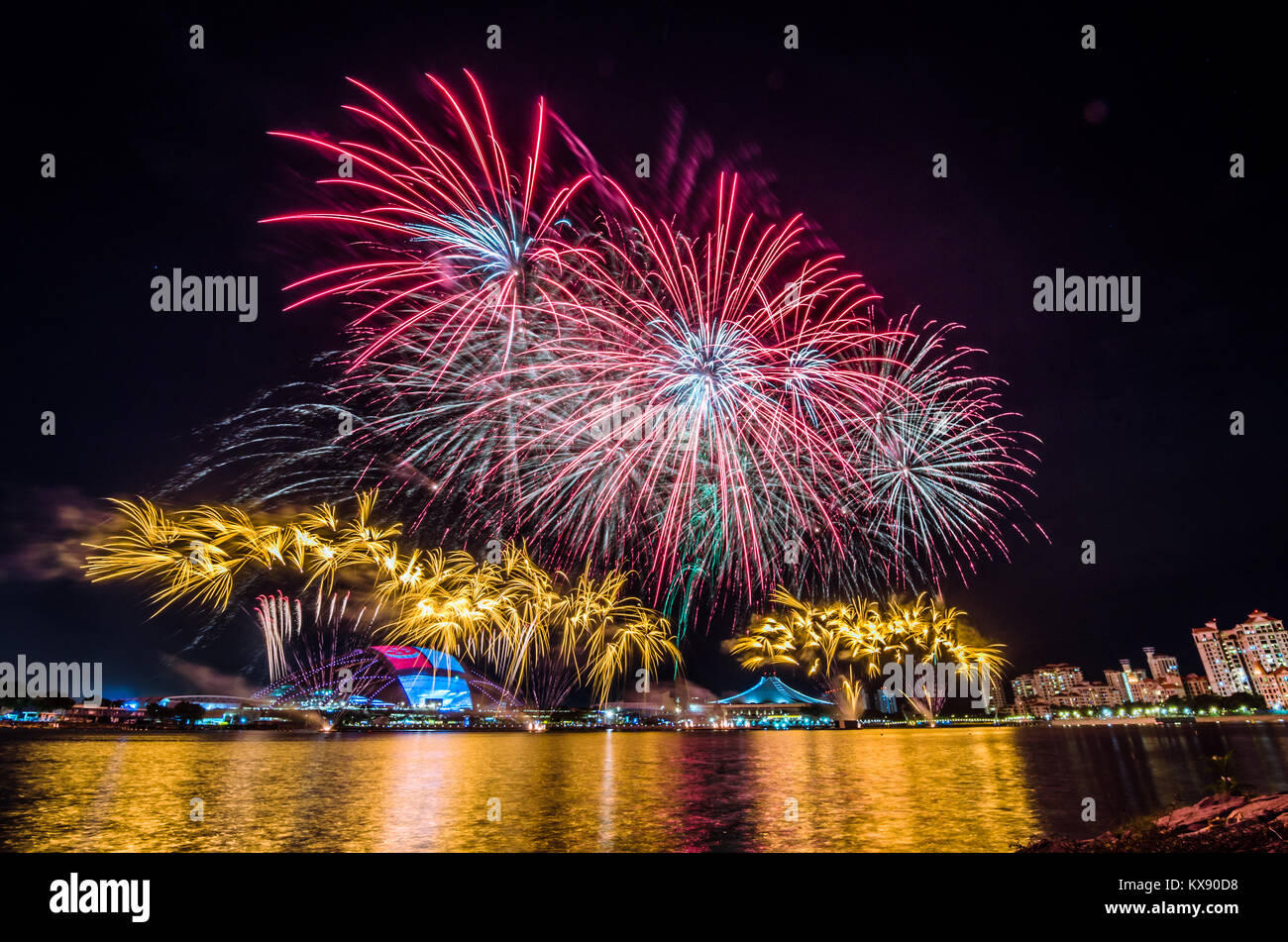 Firework display for Singapore National day which celebrated every year on August 9, in commemoration of the Singapore's independence in 1965. Stock Photo