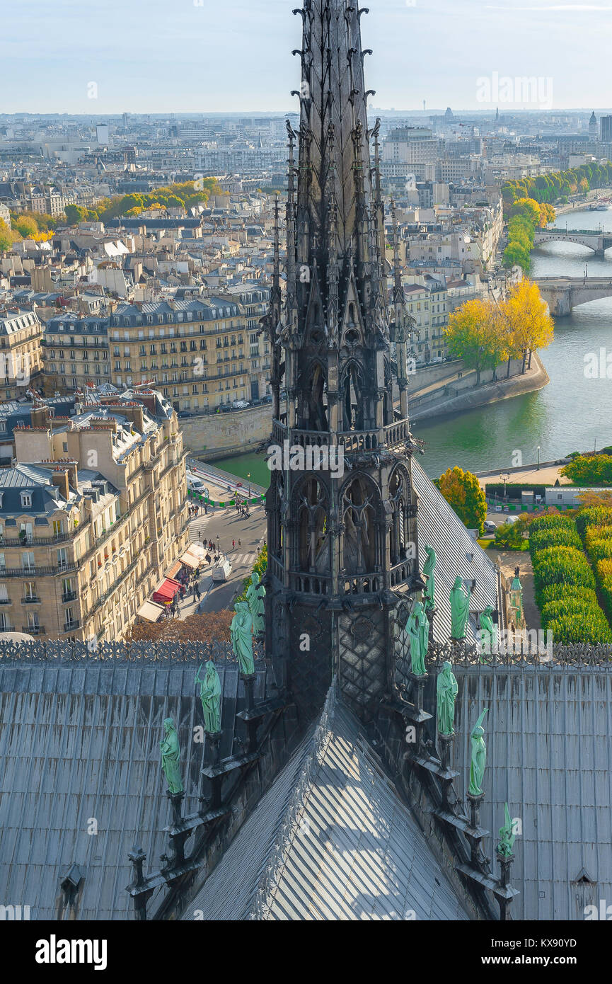 Notre Dame Paris, detail of the cathedral spire and statues of saints sited  on the roof with a view to the east of the city, Paris, France Stock Photo  - Alamy