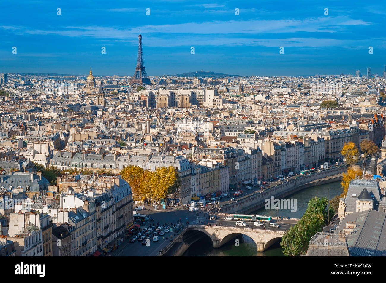 Paris city, aerial view to the west of Paris above the rooftops of the Left Bank towards the Eiffel Tower on the city skyline, France. Stock Photo
