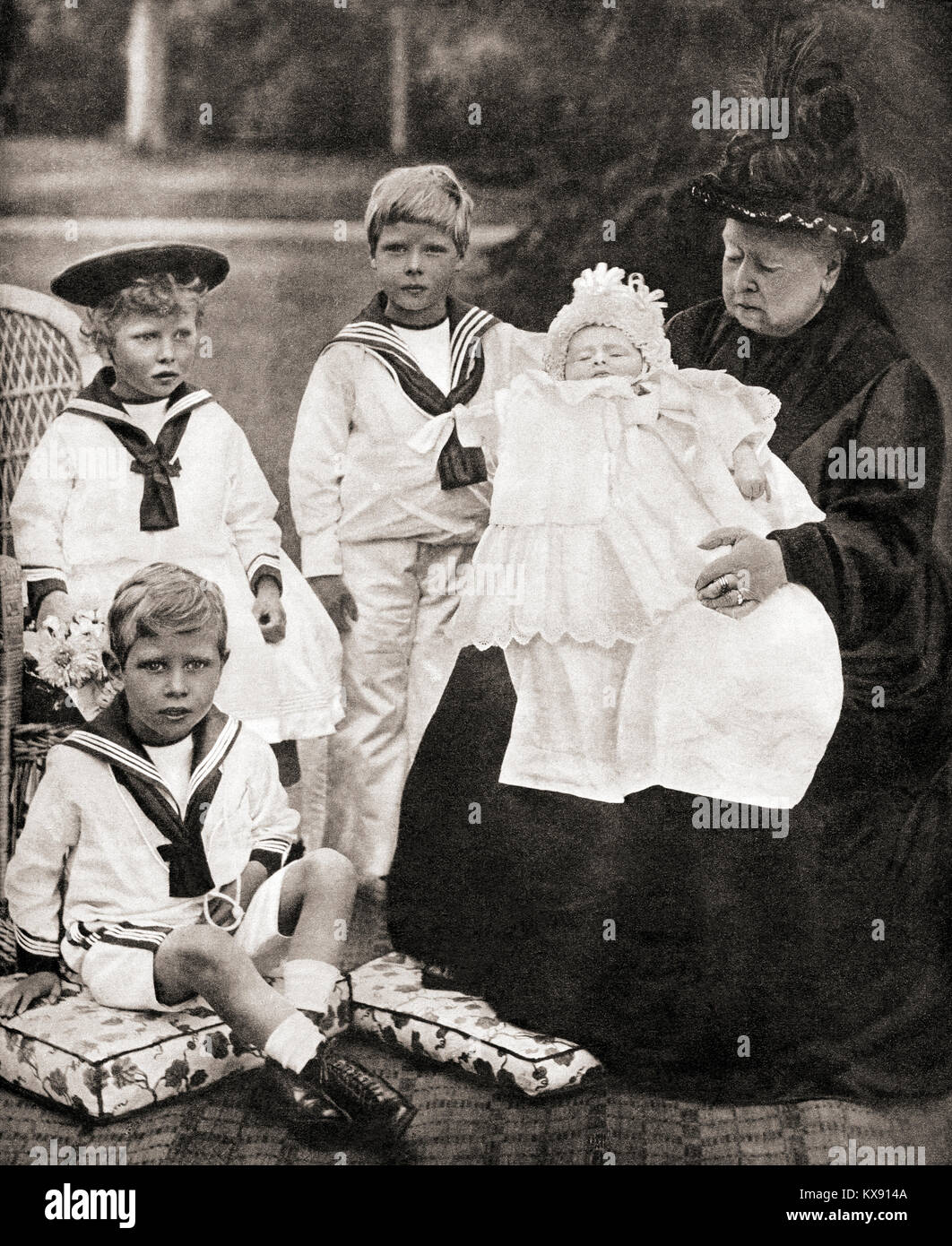 Queen Victoria and her great grand-children, from left to right, Prince Albert (future George VI), Princess Mary (Princess Royal), Prince Edward (future Edward VIII) and Prince Henry (future Duke of Gloucester), seen here in 1900.  Victoria, 1819 – 1901.  Queen of the United Kingdom of Great Britain and Ireland. Stock Photo